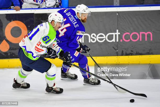 Stephane Da Costa of France and Jury Repe of Slovenia during the EIHF Ice Hockey Four Nations tournament match between France and Slovenia on...
