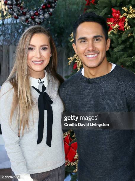 Actress Alexa PenaVega and husband actor Carlos PenaVega visit Hallmark's "Home & Family" at Universal Studios Hollywood on November 9, 2017 in...