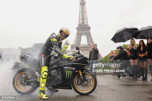 Valentino Rossi of Italy and Fiat Yamaha Team poses for photographers near the Eiffel Tower during the previews to the MotoGP of France on May 14,...