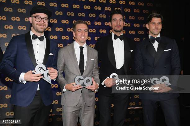 Men of the year Mark Forster, Philipp Lahm, David Gandy and Johannes Huebl are seen at the end of the GQ Men of the year Award 2017 show at Komische...