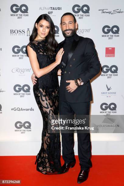 Rebecca Mir and Massimo Sinato arrive for the GQ Men of the year Award 2017 at Komische Oper on November 9, 2017 in Berlin, Germany.