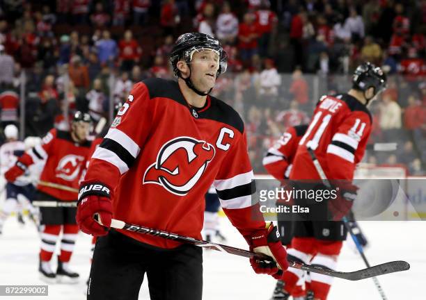 Andy Greene and Brian Boyle of the New Jersey Devils skate off the ice after losing 3-2 in overtime to the Edmonton Oilers on November 9, 2017 at...
