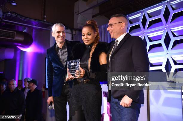 Magazine Editor-in-Chief Aaron Hicklin, Music Icon Award honoree Janet Jackson and OUT Magazine Executive VP, Publishing Joe Landry pose for a photo...