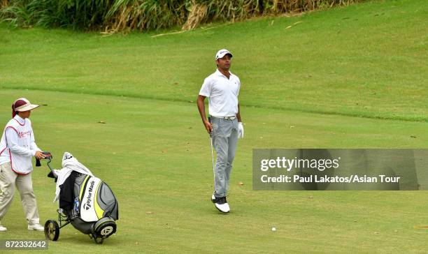 Jyoti Randhawa of India plays a shot during round two of the Resorts World Manila Masters at Manila Southwoods Golf and Country Club on November 10,...