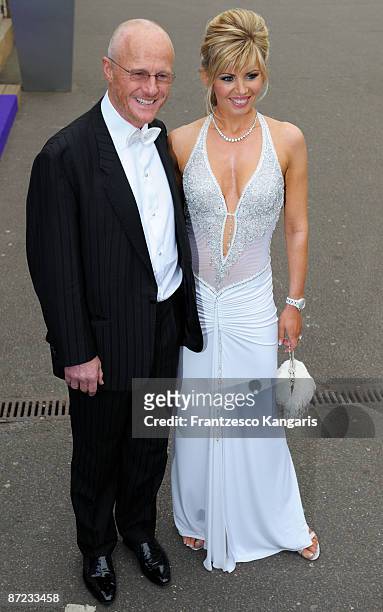 John Caudwell and Claire Johnson arrive at The Caudwell Children Butterfly Ball at Battersea Evolution on May 14, 2009 in London, England.