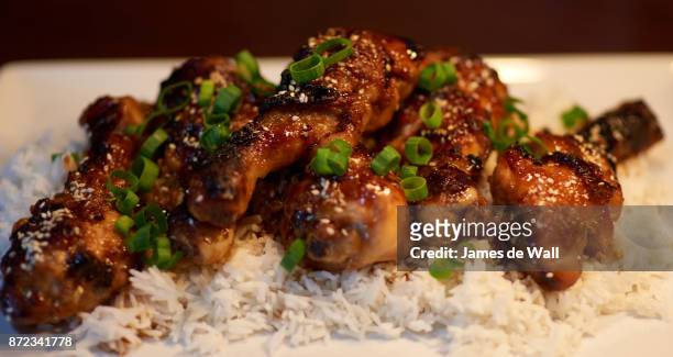 sticky chicken drumsticks - hoisin sauce stock pictures, royalty-free photos & images
