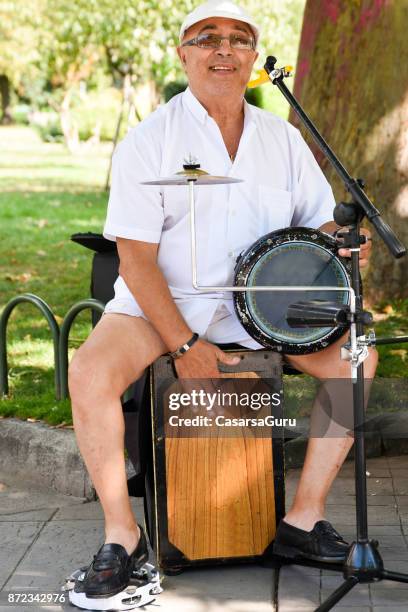 bulgarian street musician playing drums - performing arts occupation stock pictures, royalty-free photos & images