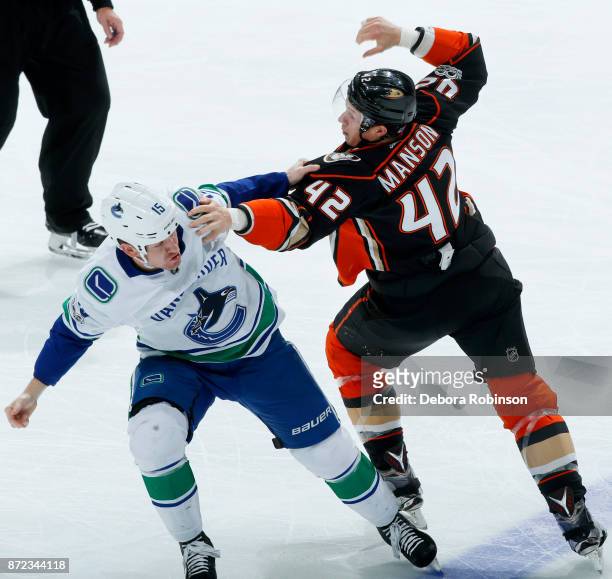 Josh Manson of the Anaheim Ducks battles in a fight against Derek Dorsett of the Vancouver Canucks during the game on November 9, 2017 at Honda...