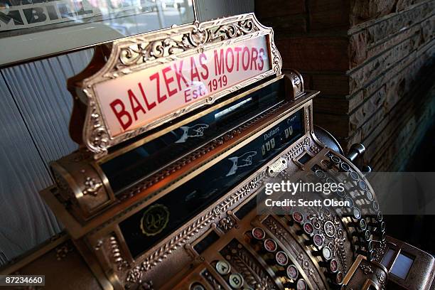 Vintage cash register sits in the showroom of Balzekas Chrysler dealership May 14, 2009 in Chicago, Illinois. The dealership, which has been in...