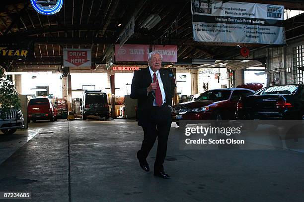 Eighty-five-year-old owner Stanley Balzekas walks through the service department at his Balzekas Chrysler dealership May 14, 2009 in Chicago,...