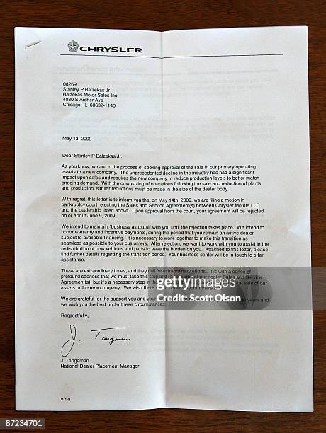 Form letter stating Chrysler will no longer honor a franchise agreement sits on a desk at Balzekas Chrysler dealership May 14, 2009 in Chicago,...