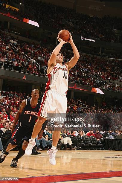 Wally Szczerbiak of the Cleveland Cavaliers takes a jump shot in front of Maurice Evans of the Atlanta Hawks in Game Two of the Eastern Conference...