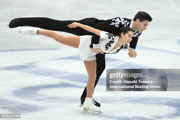 Sumire Suto and Francis Boudreau-Audet of Japan compete in the Pairs short program during the ISU Grand Prix of Figure Skating at on November 10,...