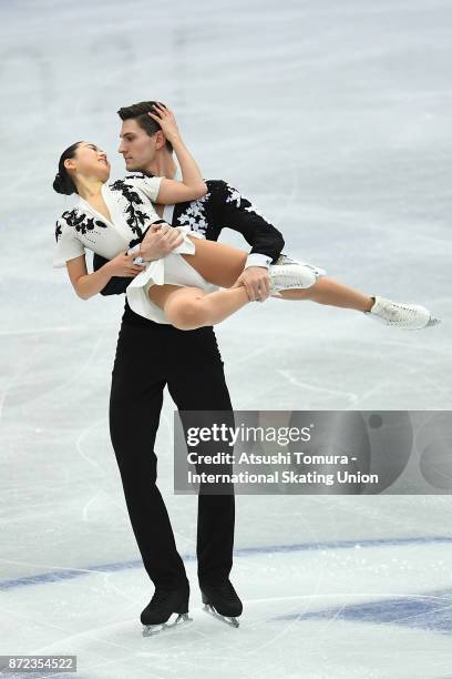 Sumire Suto and Francis Boudreau-Audet of Japan compete in the Pairs short program during the ISU Grand Prix of Figure Skating at on November 10,...