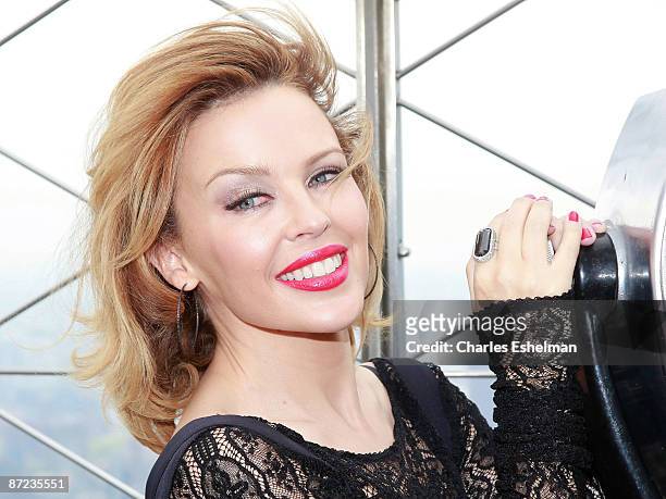 Singer/songwriter Kylie Minogue tours the Empire State Building's 86th floor observation to honor the Coty-DKMS Linked Against Leukemia partnership...