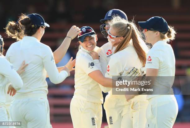 Sophie Ecclestone of England celebrates the wicket of Beth Mooney of Australia during day two of the Women's Test match between Australia and England...