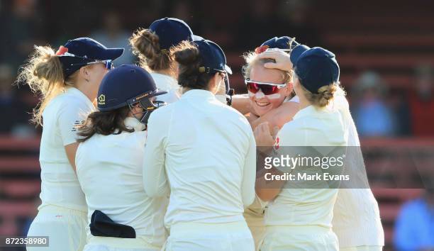 Sophie Ecclestone of England celebrates the wicket of Beth Mooney of Australia during day two of the Women's Test match between Australia and England...