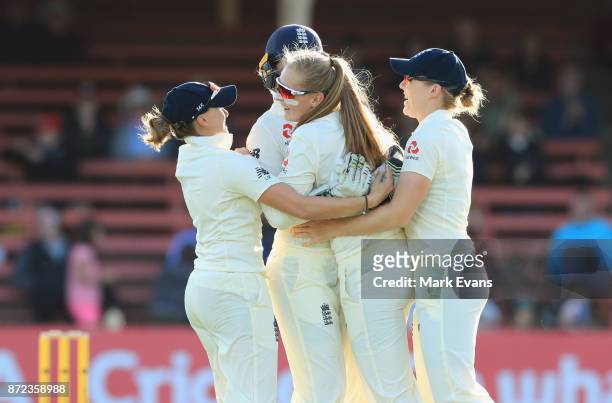 Sophie Ecclestone of England celebrates the wicket of Beth Mooney of Australia during day two of the Women's Test match between Australia and England...