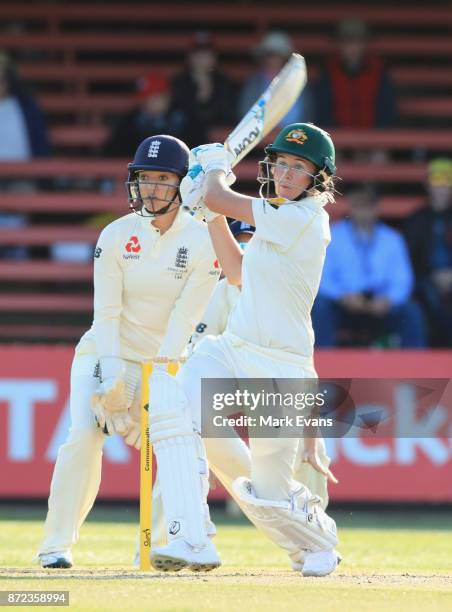 Beth Mooney of Australia hits to deep mid wicket and is caught by Natalie Sciver off the bowling of Sophie Ecclestone during day two of the Women's...