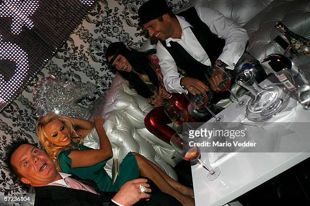 Marcus Prinz von Anhalt, actress Pamela Anderson, Mila Wiegand and her boyfriend sports editor Kai Ebel attend the "Blonde is beautiful" party hosted...