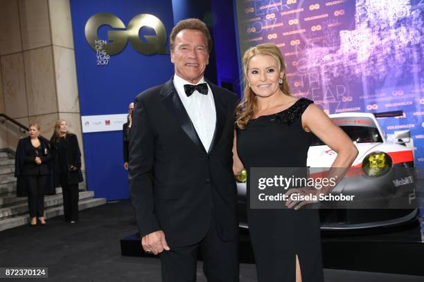 Arnold Schwarzenegger and his girlfriend Heather Milligan during the GQ Men of the year Award 2017 at Komische Oper on November 9, 2017 in Berlin,...