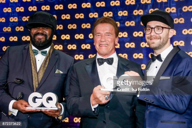 Singer and award winner Gregory Porter, US actor and award winner Arnold Schwarzenegger and German singer and award winner Mark Forster during the GQ...