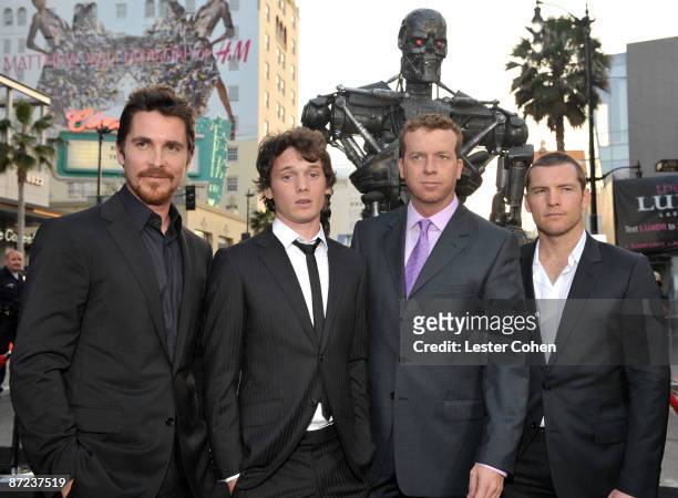 Actors Christian Bale, Anton Yelchin, Director McG and actor Sam Worthington arrive at the Premiere of Warner Bros. "Terminator Salvation" held at...