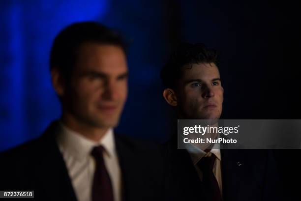 Roger Federer of Switzerland and Dominic Thiem of Austria arrive at The Official Launch for ATP Finals held at the Tower of London prior to the start...