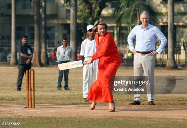 Belgium's Queen Mathilde King gestures as she leaves after playing cricket with children at a ground in Mumbai, India, November 10, 2017