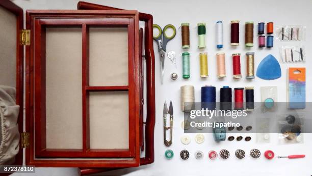 knolling. sewing box - button sewing item stock pictures, royalty-free photos & images