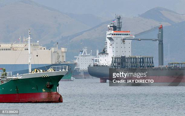 Finance-economy-Philippines-shipping,FEATURE by Mynardo Macaraig This photo taken on March 13, 2009 shows some of the 20 ships anchored at the former...