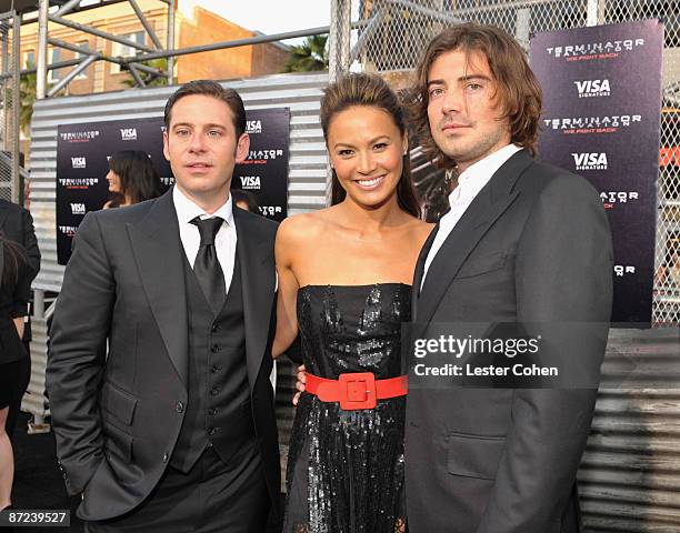 Producer Derek Anderson, actress Moon Bloodgood and producer Victor Kubicek arrive at the Premiere of Warner Bros. "Terminator Salvation" held at...