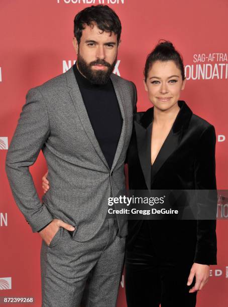 Tatiana Maslany and Tom Cullen arrive at the SAG-AFTRA Foundation Patron of the Artists Awards 2017 on November 9, 2017 in Beverly Hills, California.