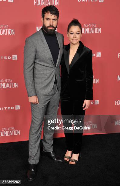 Tatiana Maslany and Tom Cullen arrive at the SAG-AFTRA Foundation Patron of the Artists Awards 2017 on November 9, 2017 in Beverly Hills, California.