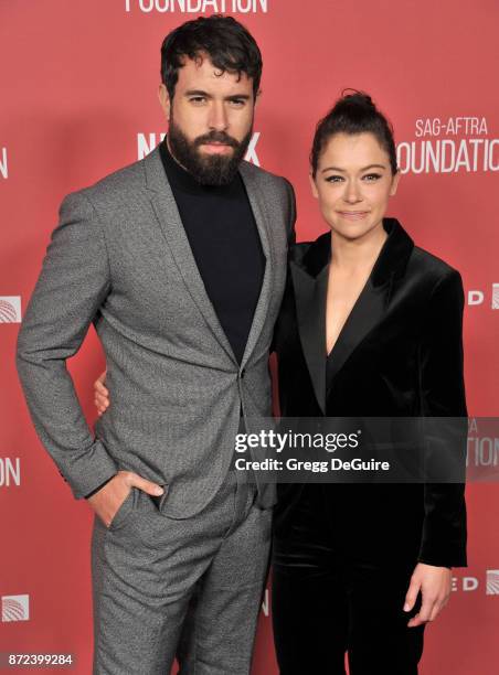 Tatiana Maslany and Tom Cullen arrive at the SAG-AFTRA Foundation Patron of the Artists Awards 2017 on November 9, 2017 in Beverly Hills, California.