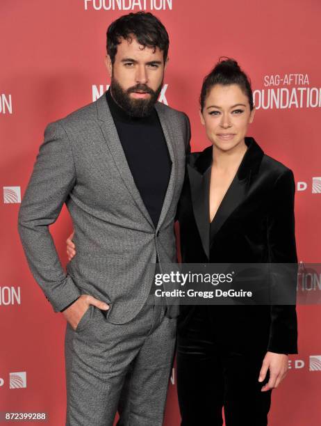 Tatiana Maslany and Tom Cullen arrive at the SAG-AFTRA Foundation Patron of the Artists Awards 2017 on November 9, 2017 in Beverly Hills, California.