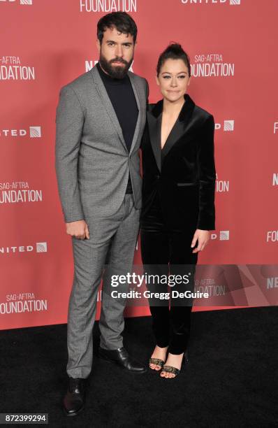 Tatiana Maslany and Tom Cullen arrive at the SAG-AFTRA Foundation Patron of the Artists Awards 2017 on November 9, 2017 in Beverly Hills, California.