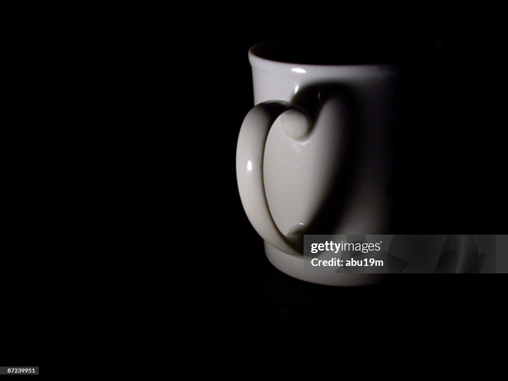 Mug on black background 