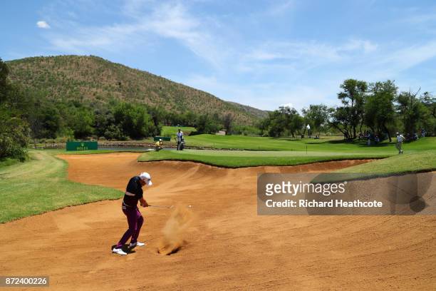Lee Slattery of England hits from a bunker on the 4th hole during the second round of the Nedbank Golf Challenge at Gary Player CC on November 10,...
