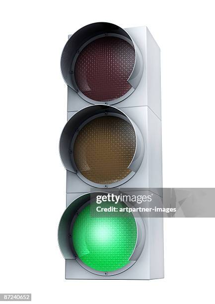 green light on white background - stoplight stock illustrations