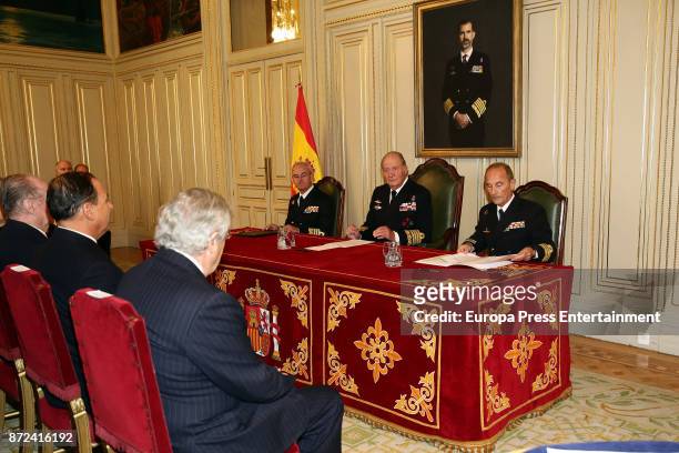 King Juan Carlos , close to a painting of his son King Felipe VI, attends Naval Museum board meeting on November 8, 2017 in Madrid, Spain.