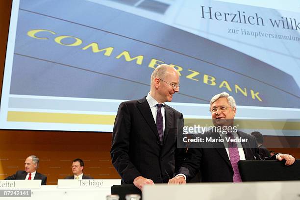 Martin Blessing , CEO of the Commerzbank AG, and Peter Mueller, head of supervisory board, attend at the annual shareholders meeting on May 15, 2009...