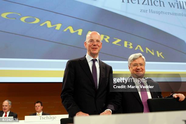 Martin Blessing , CEO of the Commerzbank AG, and Peter Mueller, head of supervisory board, attend at the annual shareholders meeting on May 15, 2009...