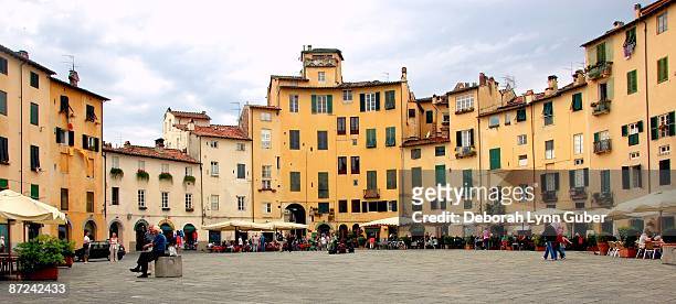 piazza dell'anfiteatro - lucca italy stock pictures, royalty-free photos & images