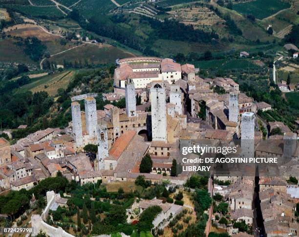 The medieval center of San Gimignano seen from West, province of Siena, Tuscany, Italy.