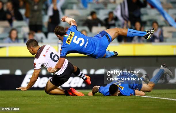 Jarryd Hayne of Fiji crashes over for a try that was later dis-allowed during the 2017 Rugby League World Cup match between Fiji and Italy at...