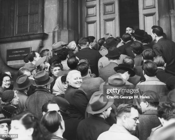 Crowds gather outside Clerkenwell Magistrates Court in London, hoping to attend the hearing in which John Reginald Christie will be charged with the...