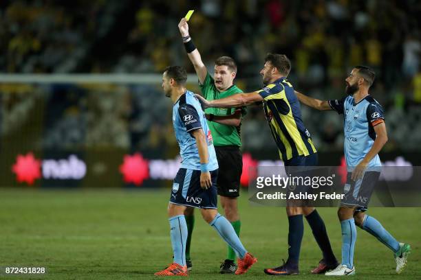 Bobo of Sydney FC receives a yellow card during the round six A-League match between the Central Coast Mariners and Sydney FC at Central Coast...