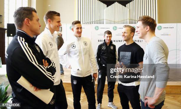 Coach Hanno Balitsch, Steffen Tigges and Phil Neumann of DFB U20 at talk with Football Freestyler Adrian Fogel and Dominik Kaiser on November 10,...