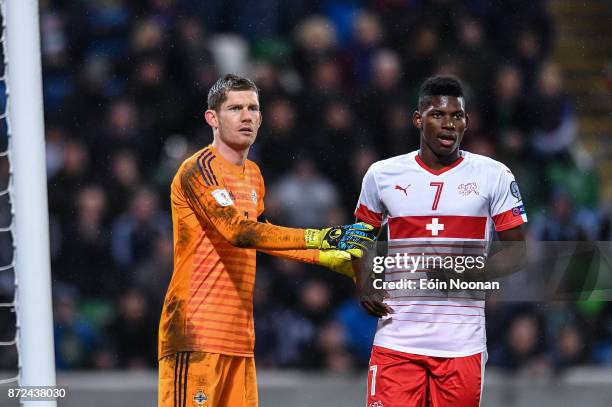 Belfast , Ireland - 9 November 2017; Michael McGovern of Northern Ireland in action against Breel Embolo of Switzerland during the FIFA 2018 World...